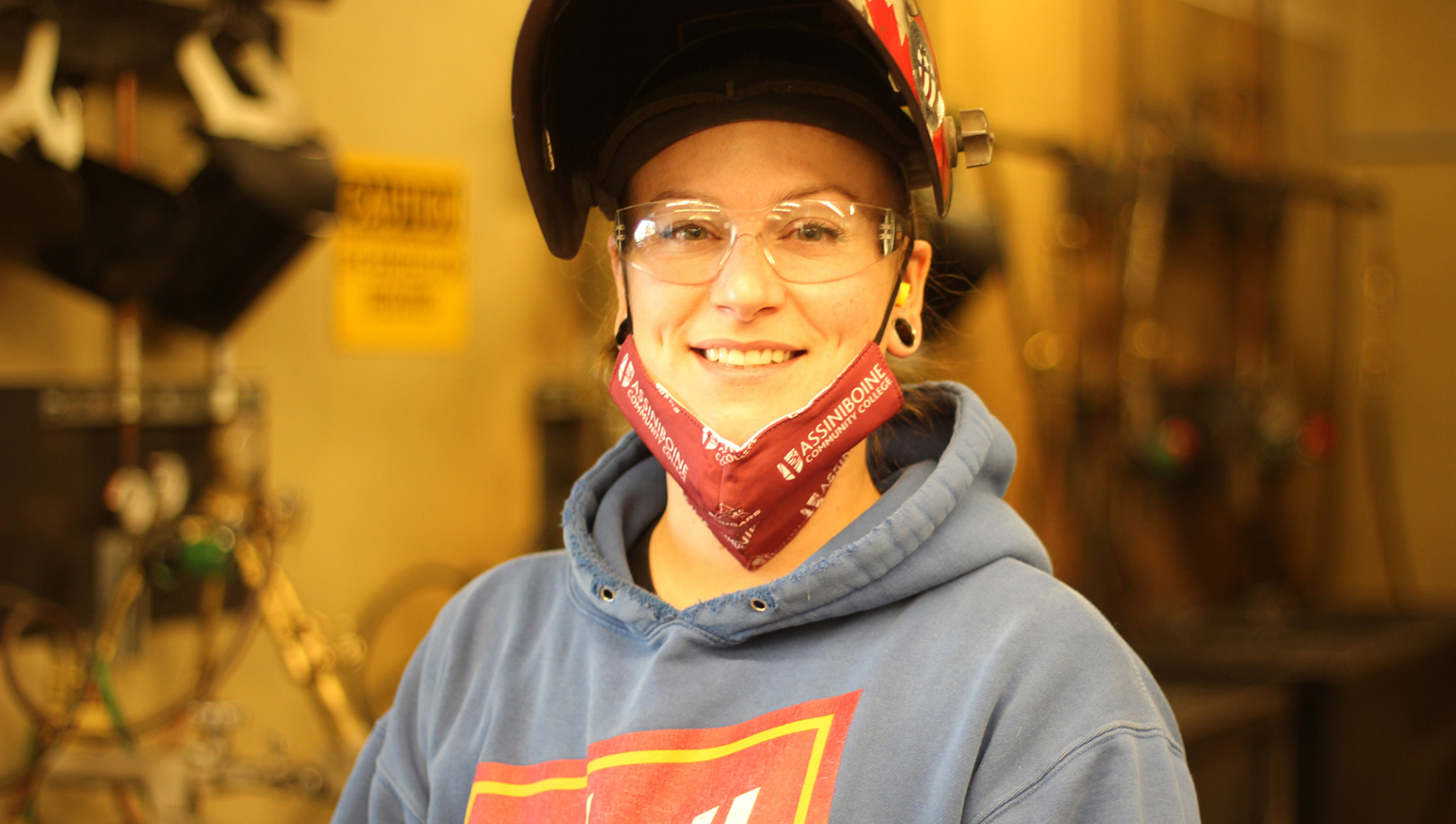 Heather Bruederlin profile photo in the welding shop.